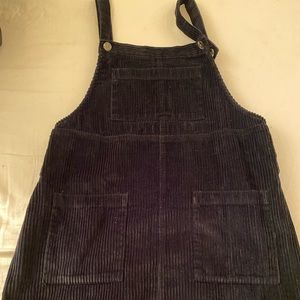 Black skirt overalls.